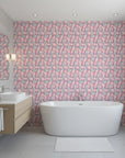 Frosted Rose Hush blush pink rose wallpaper creating ambiance in a serene bathroom