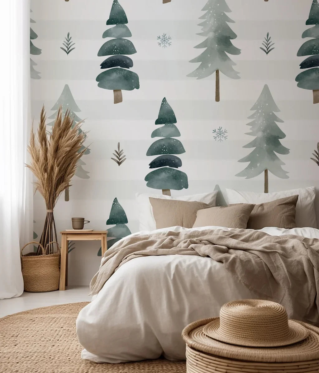 A self-adhesive wallpaper featuring a watercolor design of striped green pine trees, part of the Frosted Woods collection
