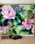 Pink and purple Full Bloom floral wallpaper on mint green background in modern bedroom setting
