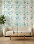 Garden Rain serene blue botanical wallpaper in a warm and inviting living room