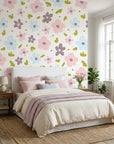 Gentle Bloom white pastel watercolor floral wallpaper adding character to a cozy bedroom
