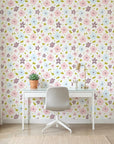 Gentle Bloom white pastel watercolor floral wallpaper as a feature wall in a bright home office