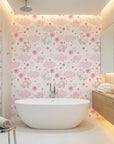 Gentle Flutter white pink elephant and cloud wallpaper creating ambiance in a serene bathroom