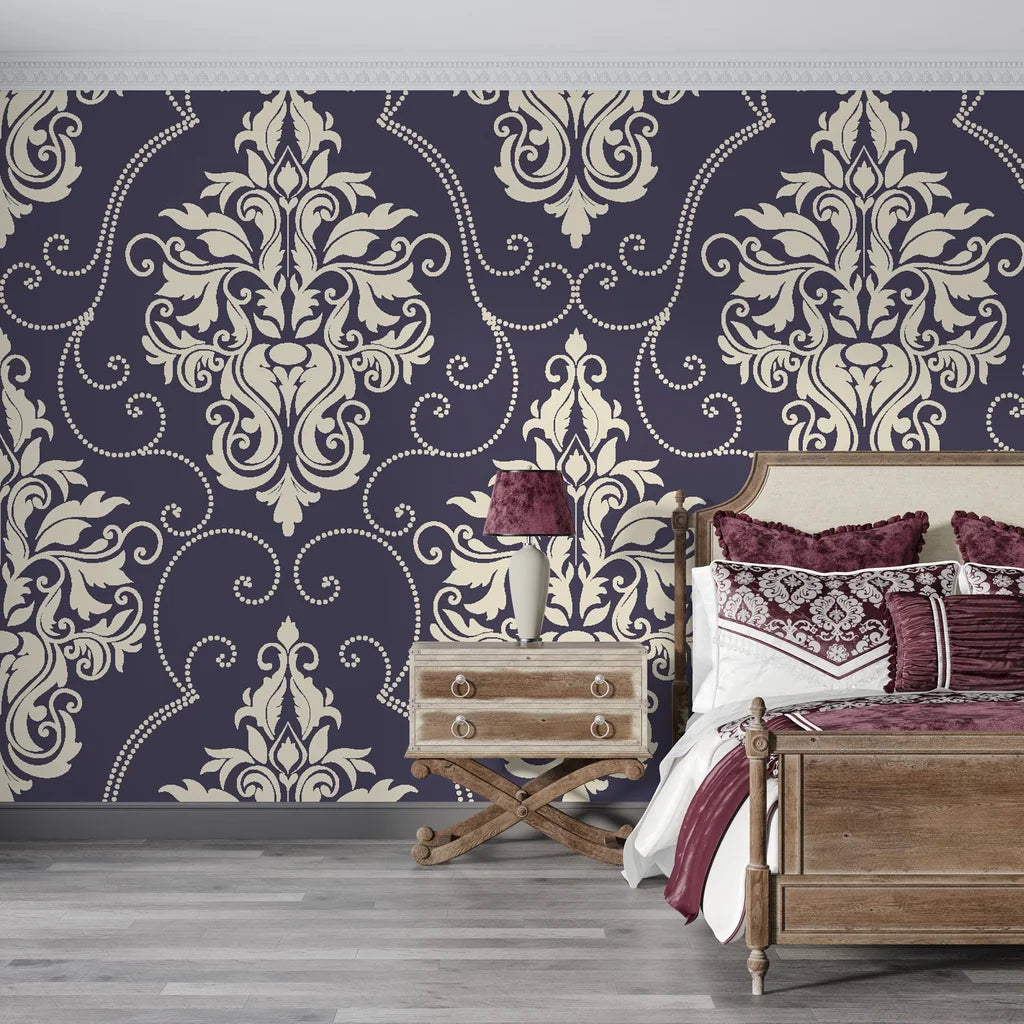 Navy and cream Gentlebotan damask wallpaper with ornate scrollwork in elegant bedroom setting
