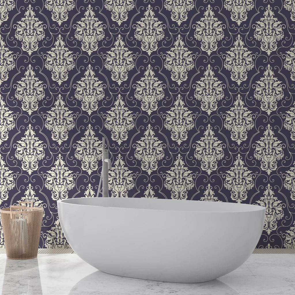 Navy and cream Gentlebotan damask wallpaper behind modern white bathtub in elegant bathroom setting