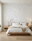 Ghost Fronds pale palm wallpaper adding character to a cozy bedroom
