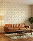 Gilded Arcade elegant gold art deco wallpaper in a warm and inviting living room