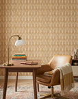 Gilded Bark golden neutral abstract wallpaper as a feature wall in a bright home office