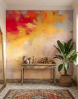 Gilded Blush soft watercolor abstract wallpaper as a feature wall in a bright home office