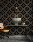 Gilded Cage black and gold geometric diamond trellis wallpaper as a feature wall in a bright home office