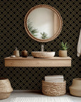 Gold and black self-adhesive wall covering featuring a geometric diamond trellis pattern, named Gilded Cage