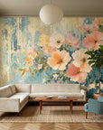Gilded Garden wallpaper with soft pink blooms on teal brushstroke background in modern living room