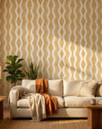Gilded Rain ochre geometric peel and stick wallpaper in a warm and inviting living room