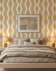 Gilded Rain ochre geometric peel and stick wallpaper adding character to a cozy bedroom