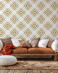 Self-adhesive 'Gilded Shards' wallpaper featuring a geometric diamond pattern in gold and white
