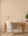 Gilded Sun warm geometric peel and stick wallpaper as a feature wall in a bright home office
