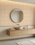 Gilded Sun warm geometric peel and stick wallpaper creating ambiance in a serene bathroom