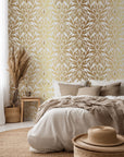 Metallic gold and white damask peel and stick wallpaper featuring a botanical pattern labeled 'Gilded Symmetry'