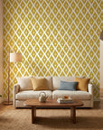 Gilded Temple golden geometric peel and stick wallpaper in a warm and inviting living room