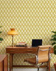 Gilded Temple golden geometric peel and stick wallpaper as a feature wall in a bright home office