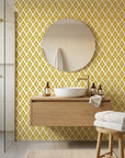 Gilded Temple golden geometric peel and stick wallpaper creating ambiance in a serene bathroom