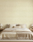 Gold Rush golden vintage chevron wallpaper adding character to a cozy bedroom