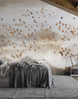 Golden Birds wallpaper mural with flying flock over misty landscape in modern bedroom setting