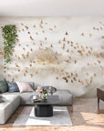 Golden Birds removable wallpaper on living room accent wall with soft clouds and flying bird motifs