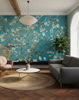 Turquoise and cream Golden Blossoms wallpaper featuring Van Gogh-inspired almond branches in modern living room