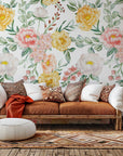 Self-adhesive wall covering with a pink and yellow watercolor floral pattern, known as Golden Blush