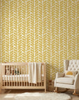 Golden Coral mustard geometric peel and stick wallpaper bringing warmth to a peaceful nursery