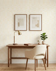 Golden Echo removable wallpaper with cream and gold geometric diamond pattern in modern home office setting