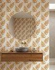 Golden and cream Golden Fern botanical wallpaper in modern bathroom with floating vanity