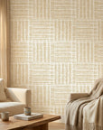 Golden Grasscloth geometric basketweave wallpaper in warm neutral living room with natural light