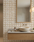 Gold and white Golden Loom basketweave wallpaper in modern bathroom with vessel sink