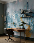 Golden Mist blue and gold abstract wallpaper adding character to a cozy bedroom