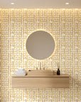Golden Path geometric taupe peel and stick wallpaper creating ambiance in a serene bathroom