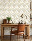 Golden Ramble pastel floral peel and stick wallpaper as a feature wall in a bright home office