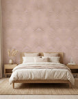 Golden Whisper blush pink and gold scallop arc wallpaper in a warm and inviting living room
