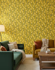 Golden Stitch Garden golden yellow floral wallpaper in a warm and inviting living room