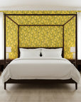 Golden Stitch Garden golden yellow floral wallpaper adding character to a cozy bedroom