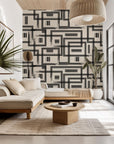 Self-adhesive wall covering featuring a beige and black hand-sketched geometric grid pattern (Gridded Scrawl style)