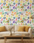 Happy Chaos colorful cutout alphabet letter wallpaper in a warm and inviting living room