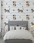 Adorable puppies and kittens scattered on a striped background for nursery walls - Happy Stroll