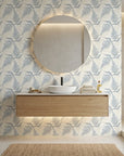 Harbor Fern blue botanical peel and stick wallpaper creating ambiance in a serene bathroom