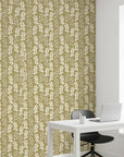 Harvest Sprig warm olive botanical wallpaper as a feature wall in a bright home office