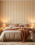 Harvest Stripe rustic orange stripe wallpaper adding character to a cozy bedroom