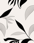 Abstract botanical wallpaper with flowing black leaves and fine line drawn foliage on a warm ivory background.