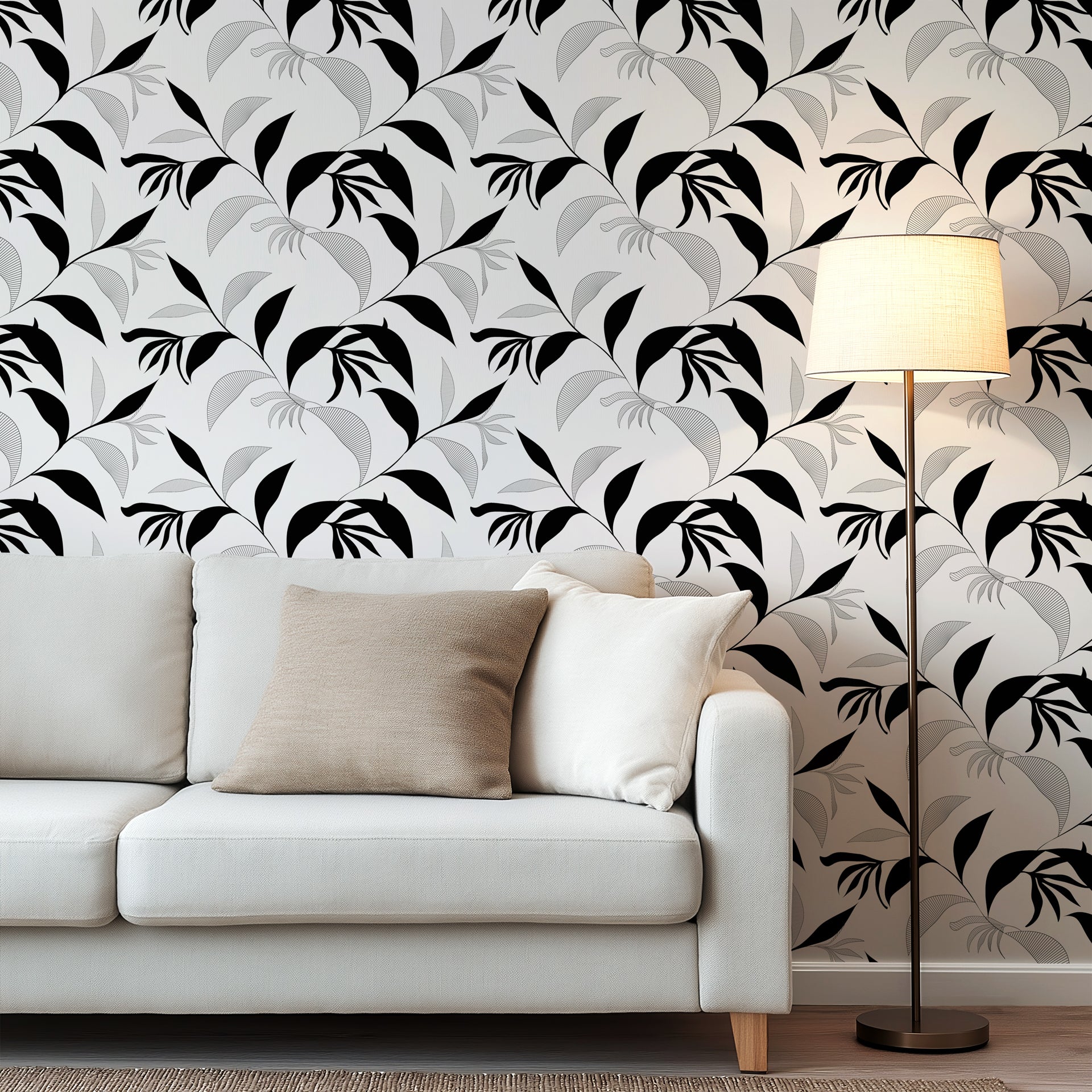 Abstract botanical wallpaper with flowing black leaves and fine line drawn foliage on a warm ivory background.
