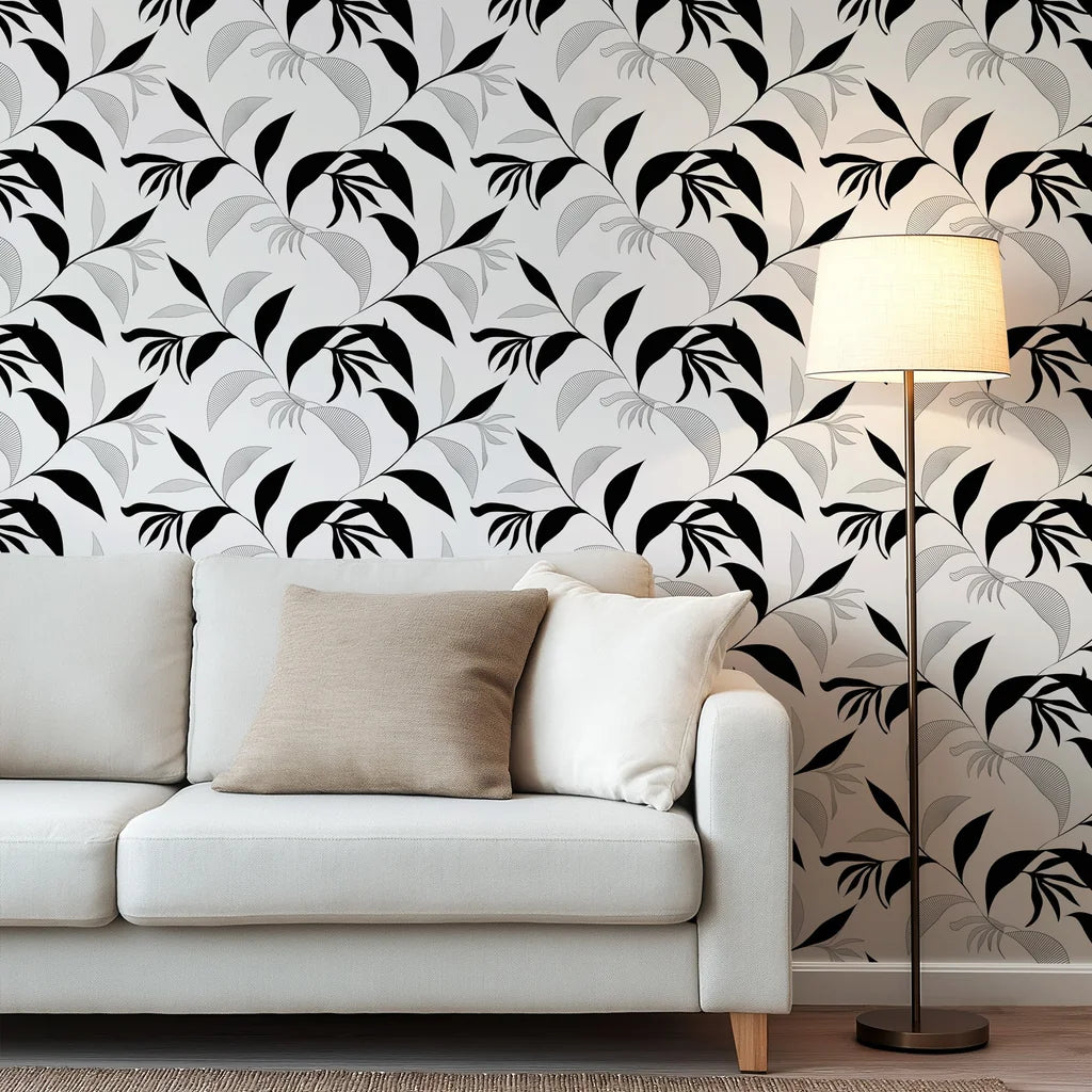 Wallpaper design showing non-representational, dark-colored leaves and delicately sketched plant life upon a pale buff surface